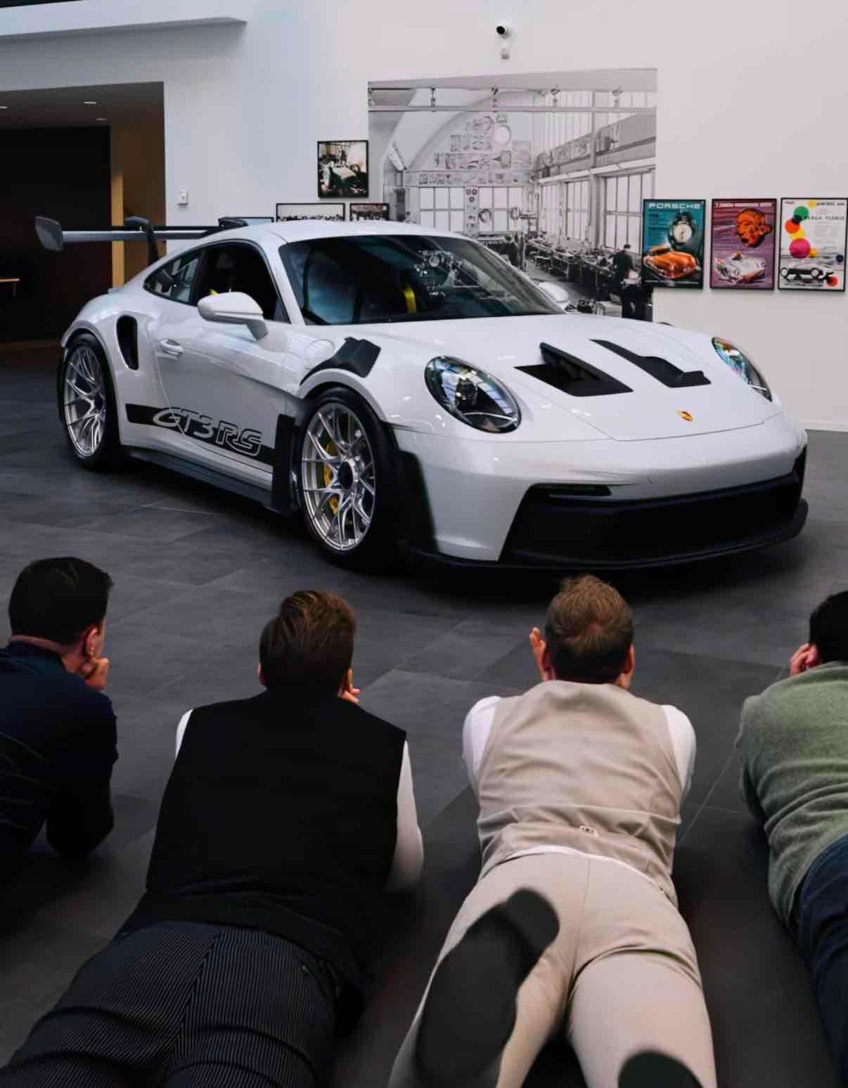 Buying Porsche, the stock or the car